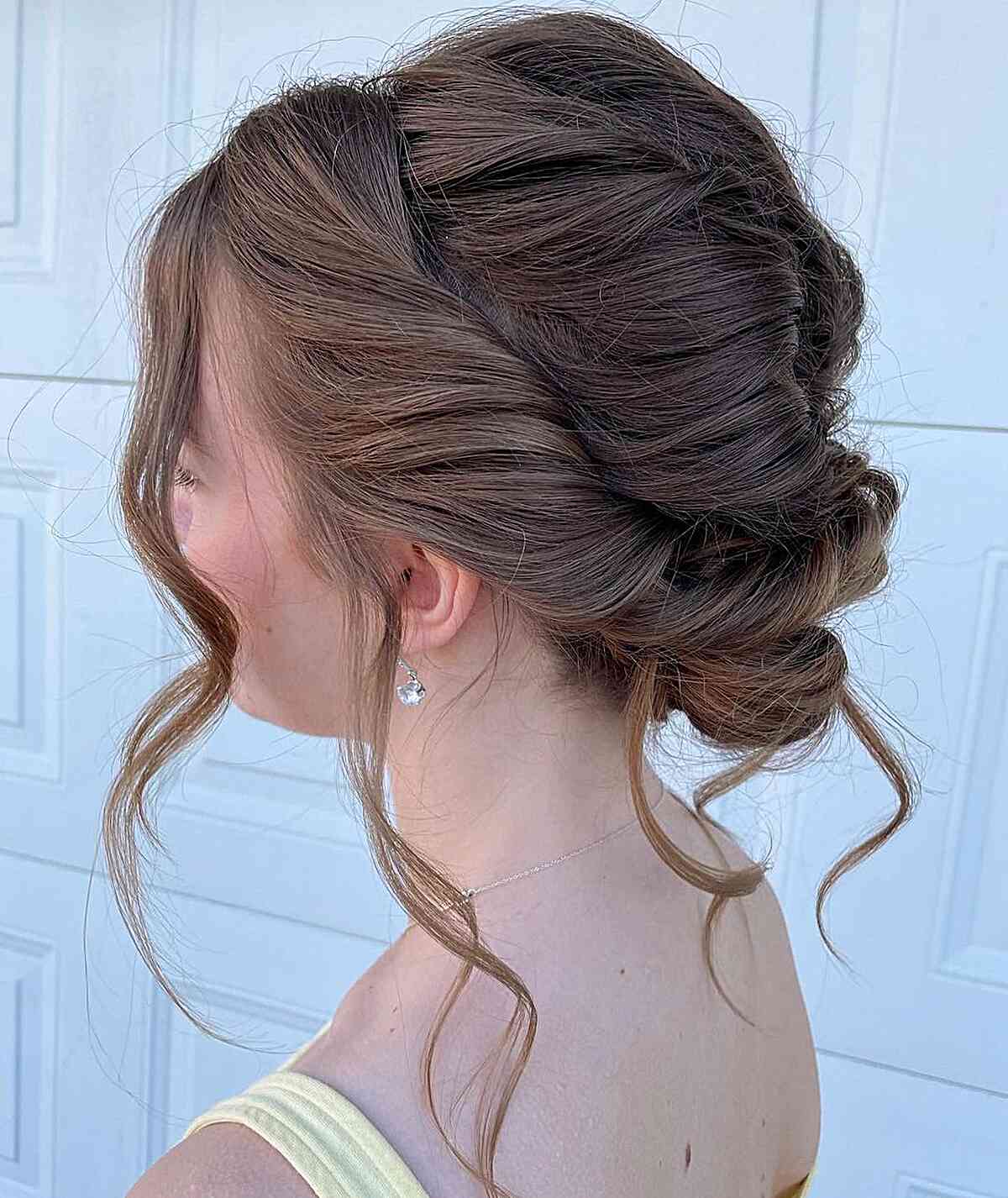 Graduation French Twisted Low Bun with Loose Wavy Strands