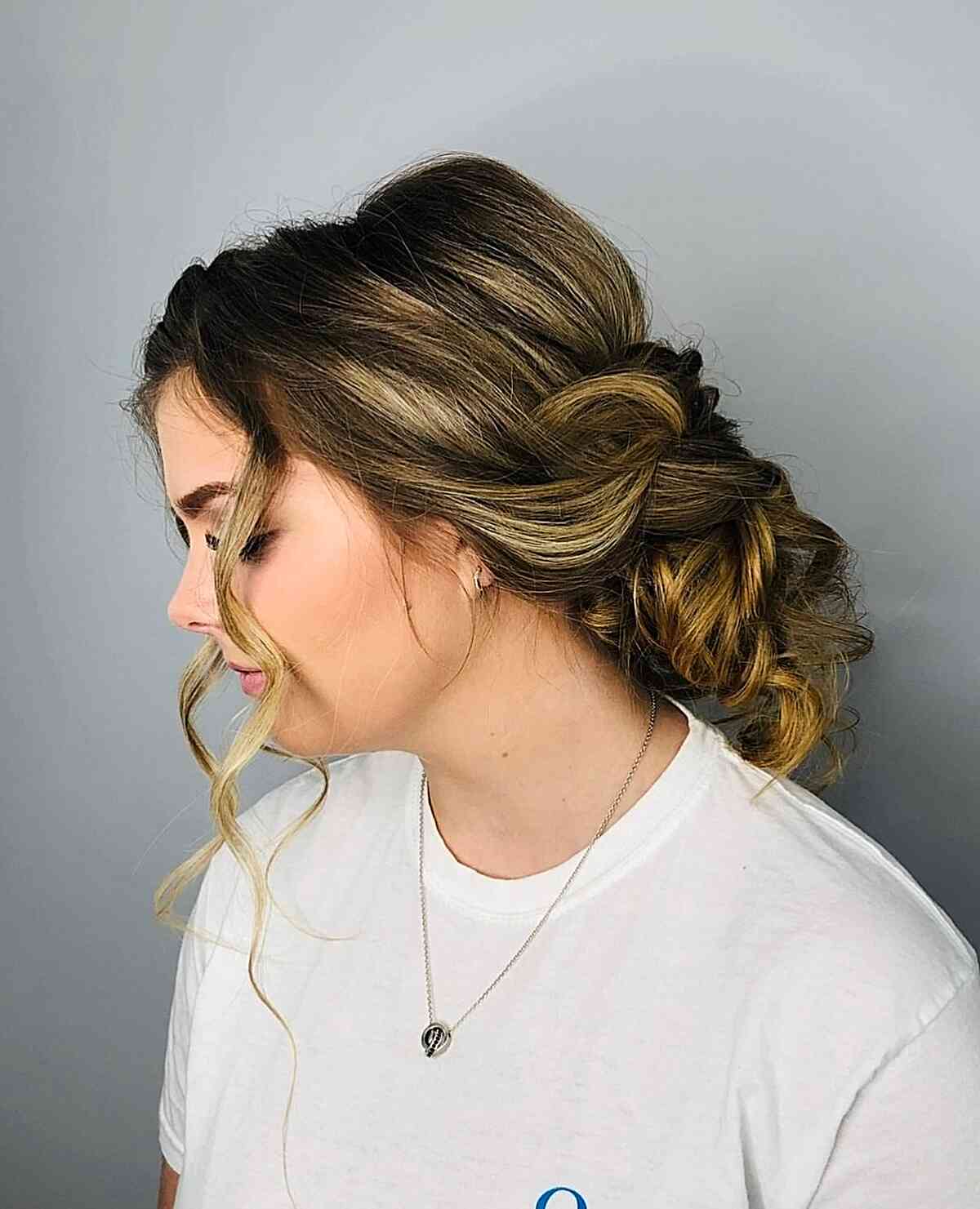 Graduation Thick Low Bun Hairstyle with Twists