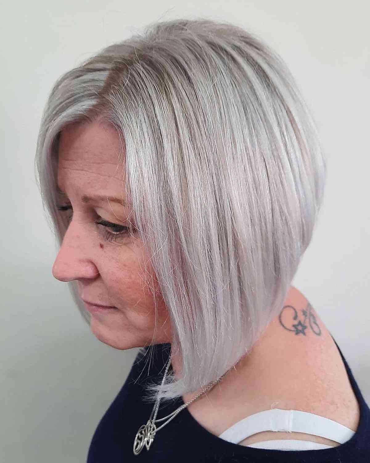 Gray Balayage Bob with Darker Roots for Women Over Sixty with Grey Hair