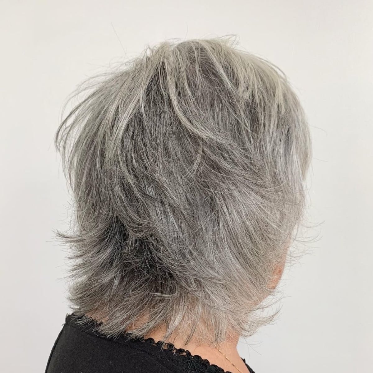 Stunning Gray Hair Color with Light Streaks