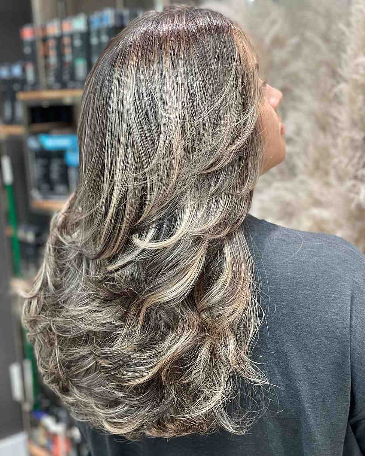 grey and blonde long feathered hair