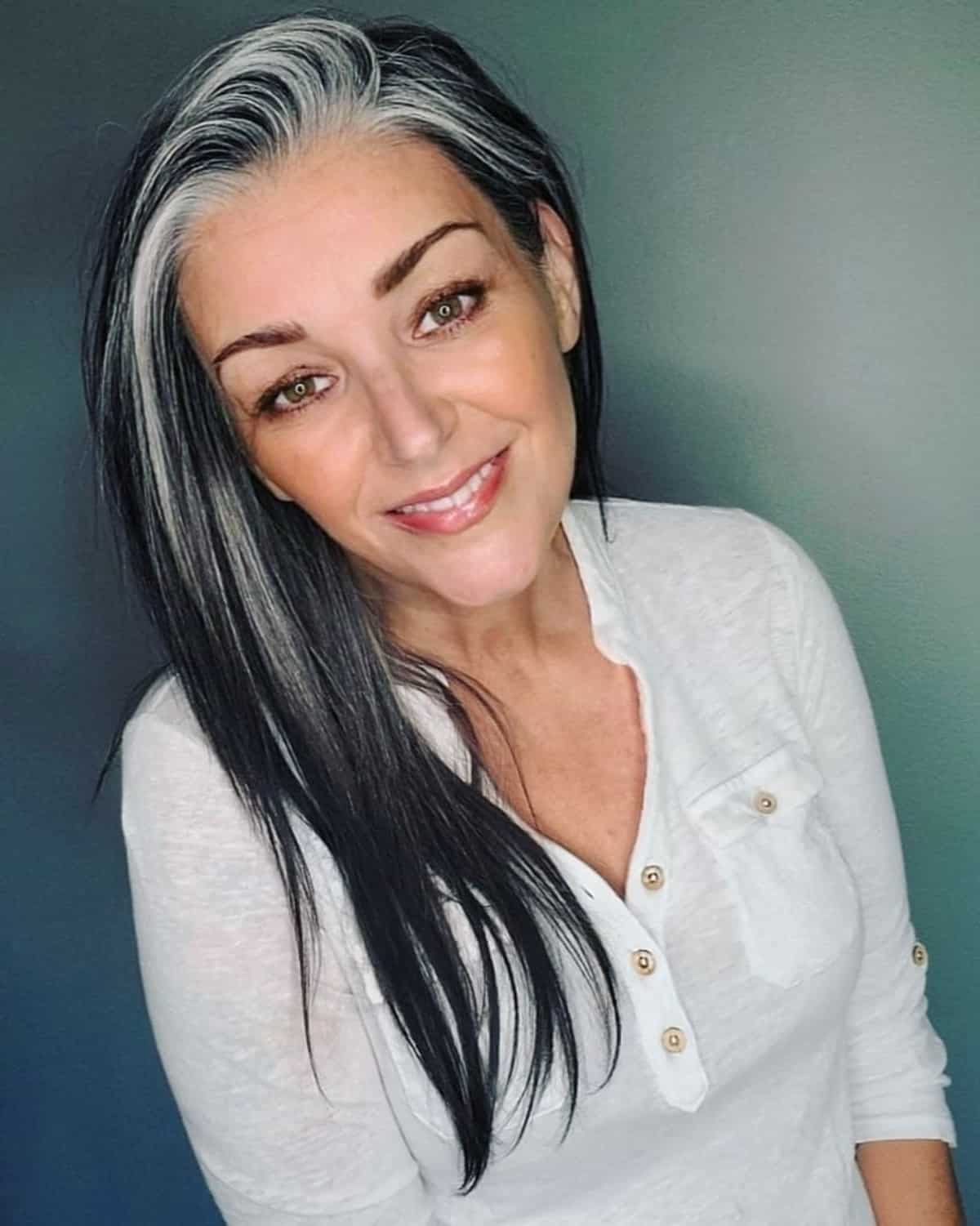 Gorgeous grey hair color with dark streaks