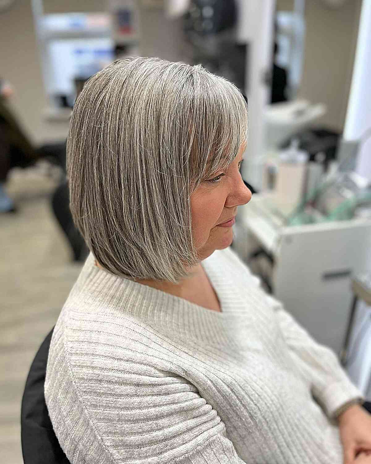 Grey Lob with Thin Bangs for Women Aged 50