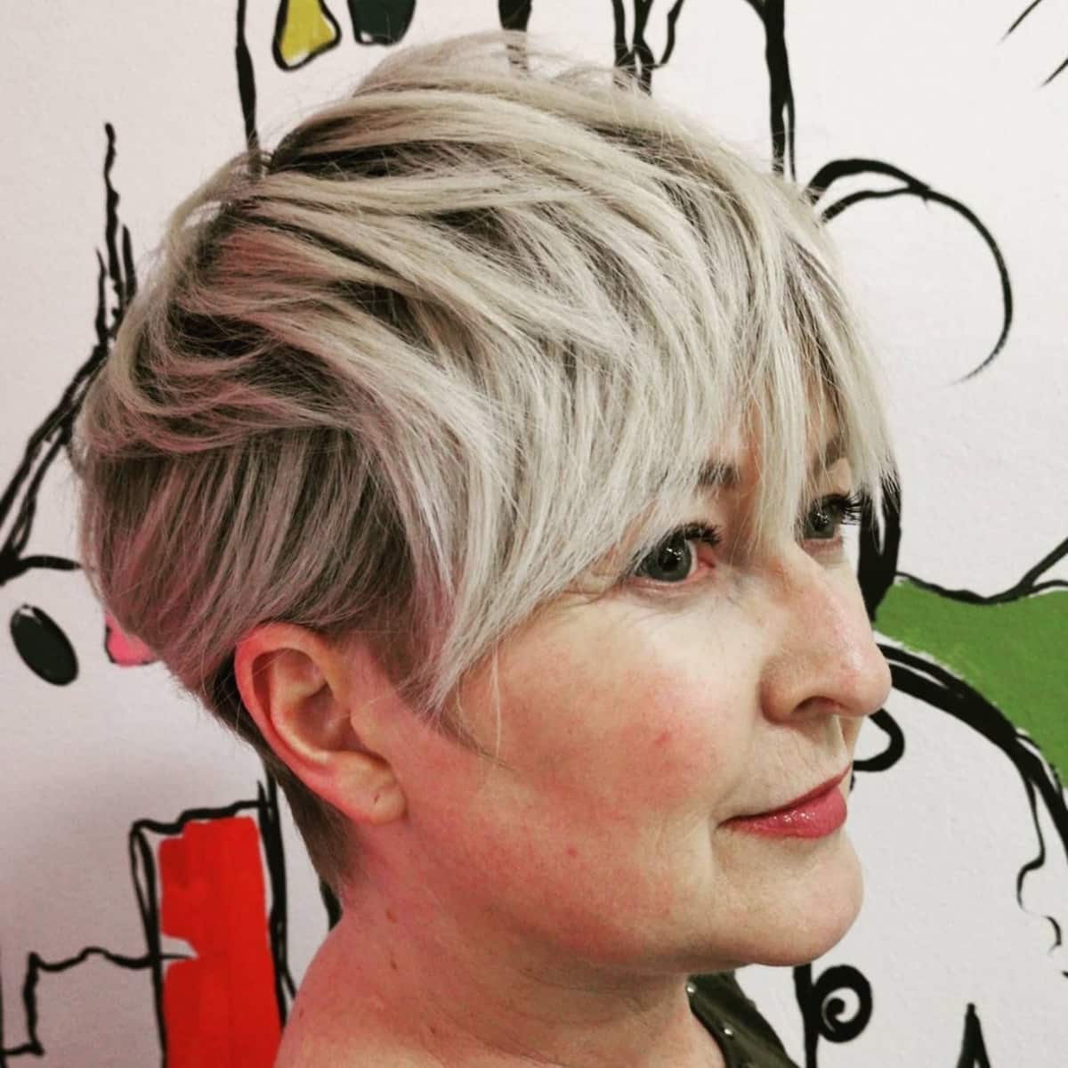 grey pixie with wispy bangs for women over 60