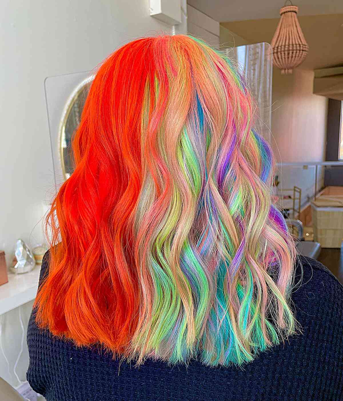 Mid-Length Half Neon Orange and Half Rainbow Split Dye Hair