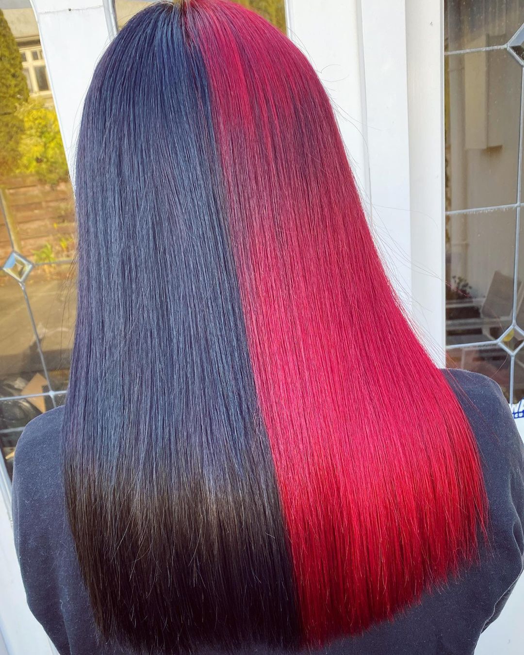 Short half red half black hair with bangs.
