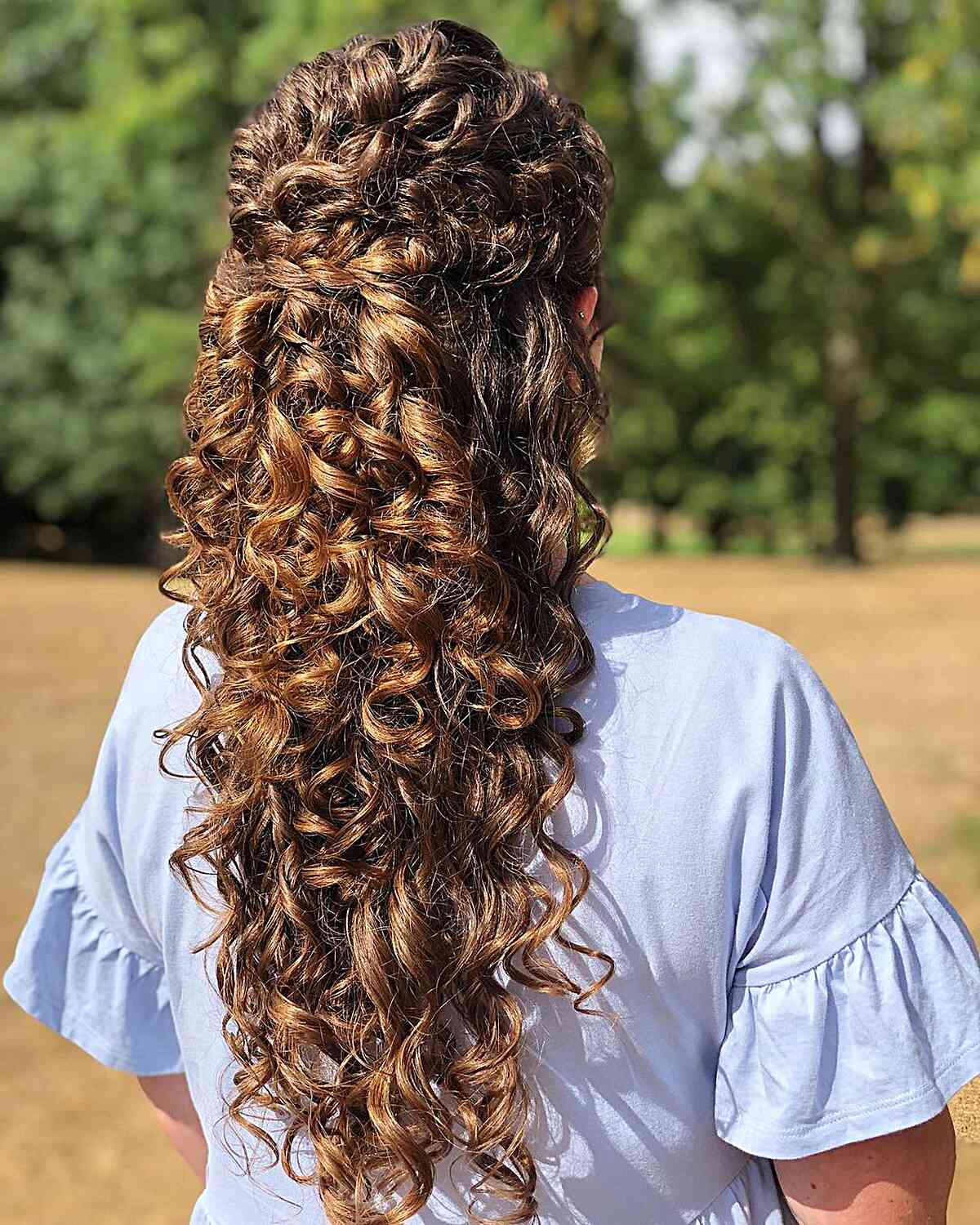 Half-Up Prom Style with Long Voluminous Curly Twists for long hair
