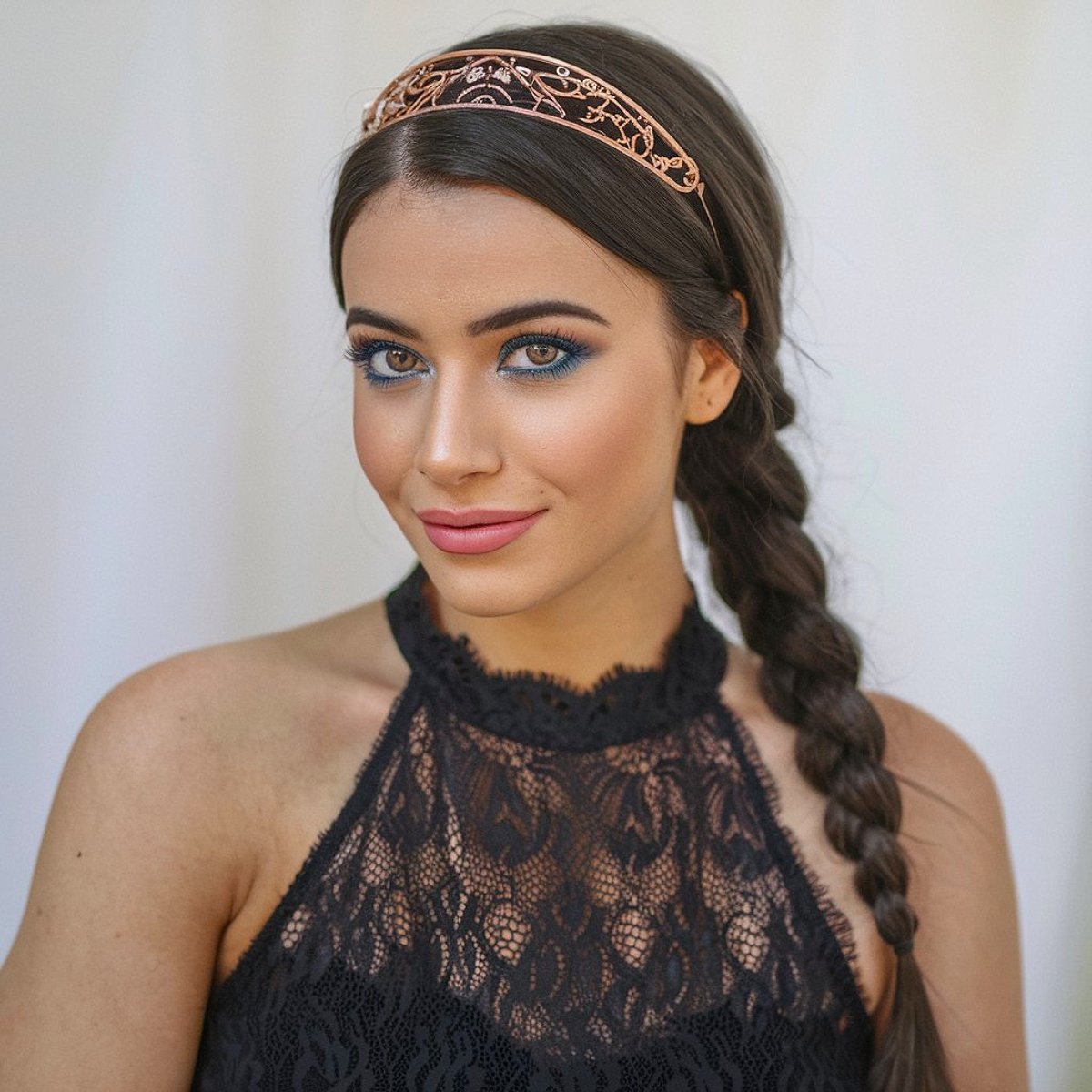 Halloween hairstyle with a long braid and decorative headband