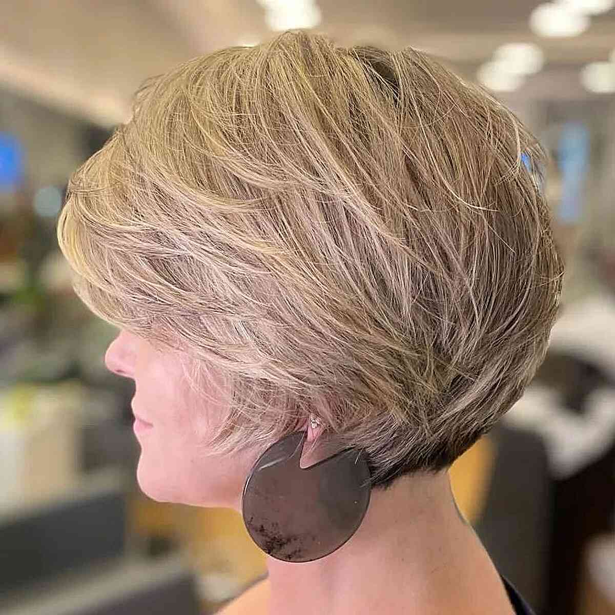 Heavily Layered Feathered Bob Cut for Short Hair