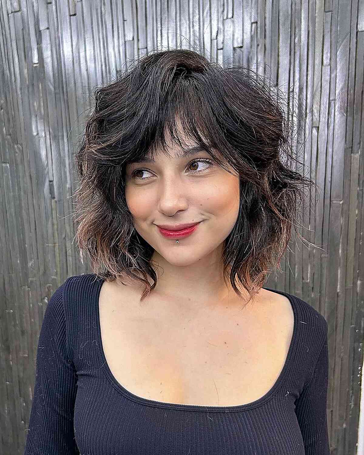 Heavily-Layered Medium Shattered Bob with Subtle Highlights and Light Bangs