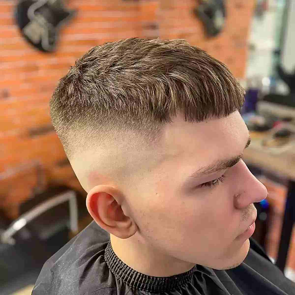 High Bald Fade with Textured Micro Bangs on Men