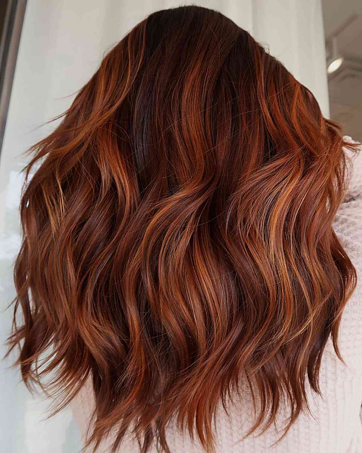 High Contrast Red Balayage Hair for women with thick mid-length hair