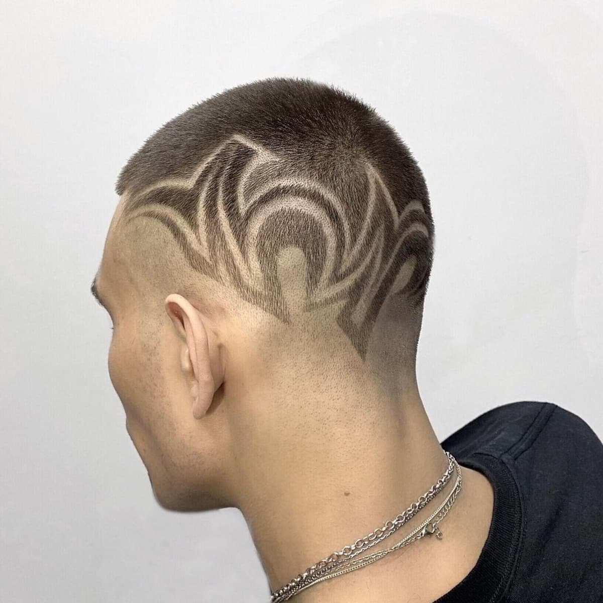 High fade and shaved abstract design for guys