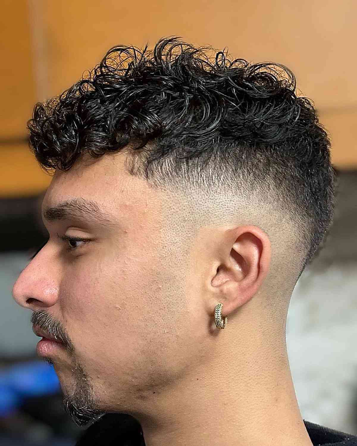 Higher Fade Curly Hairstyle