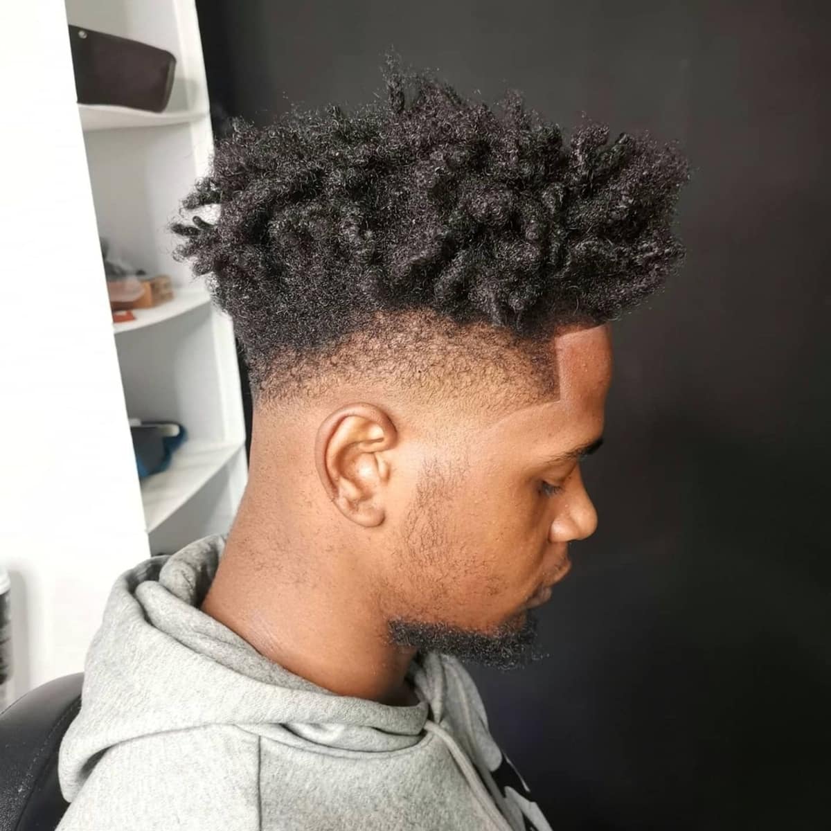 Stylish high fade haircut on an afro