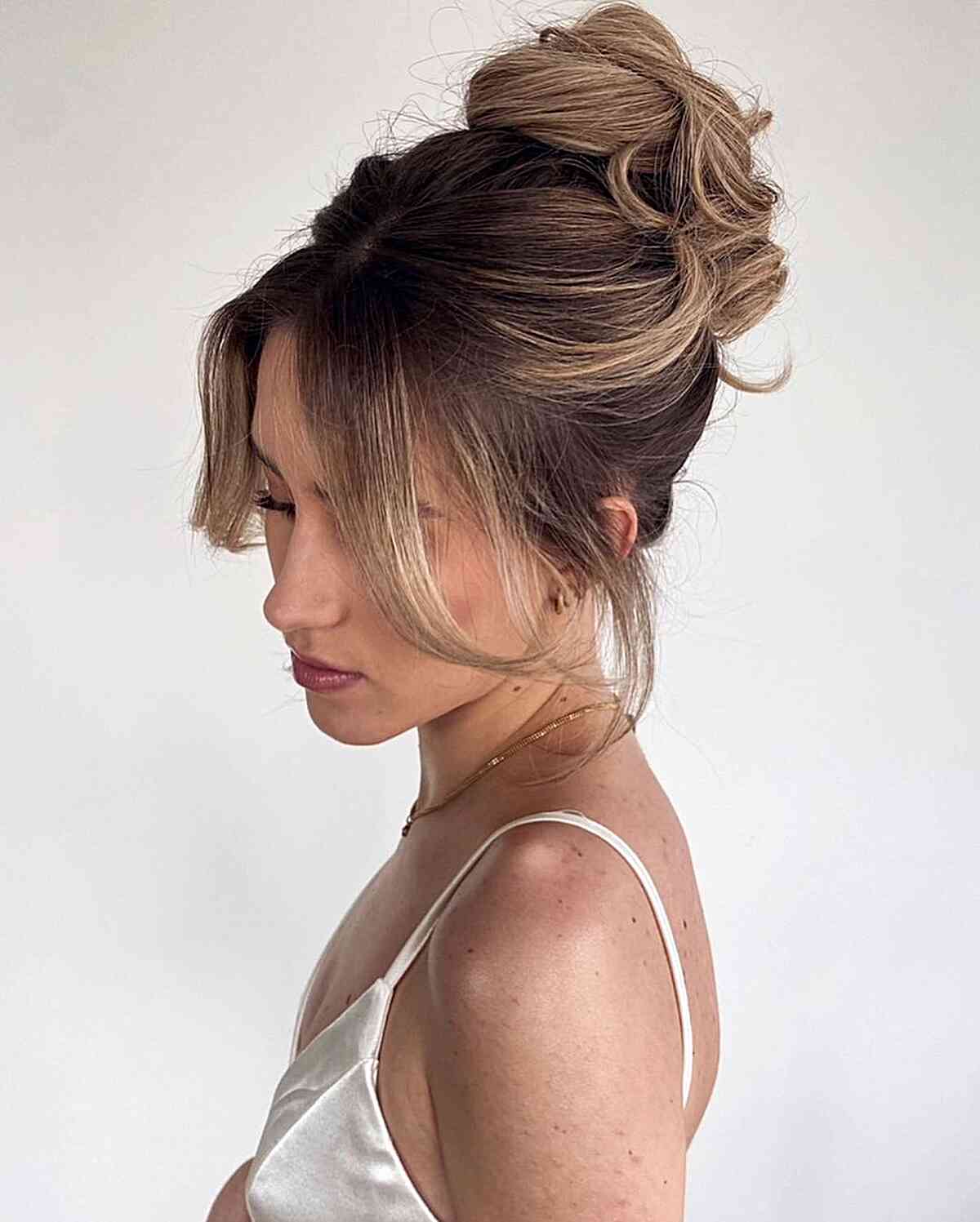 High French Twist Updo with Front Layers and Bangs