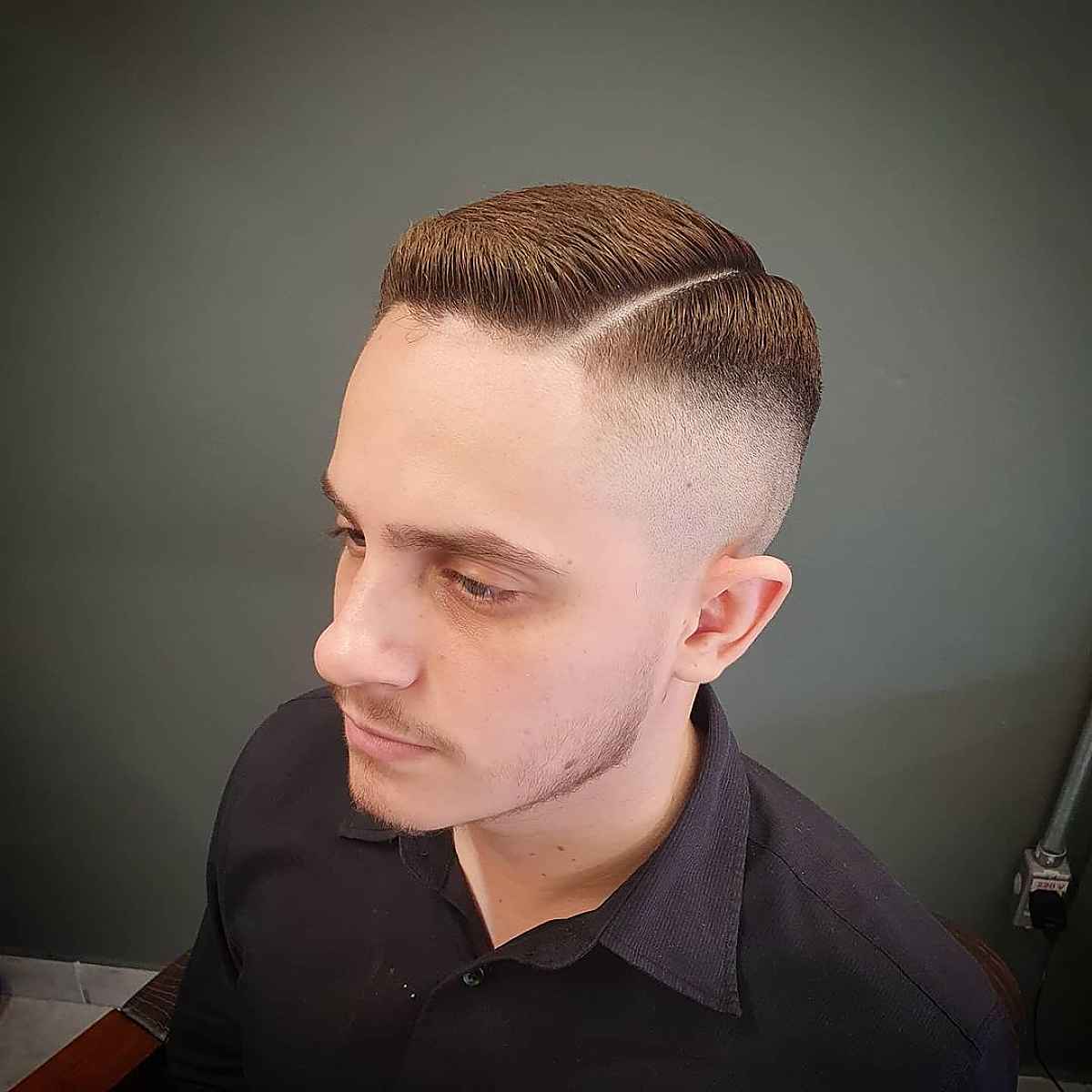 High-mid fade with shaved part