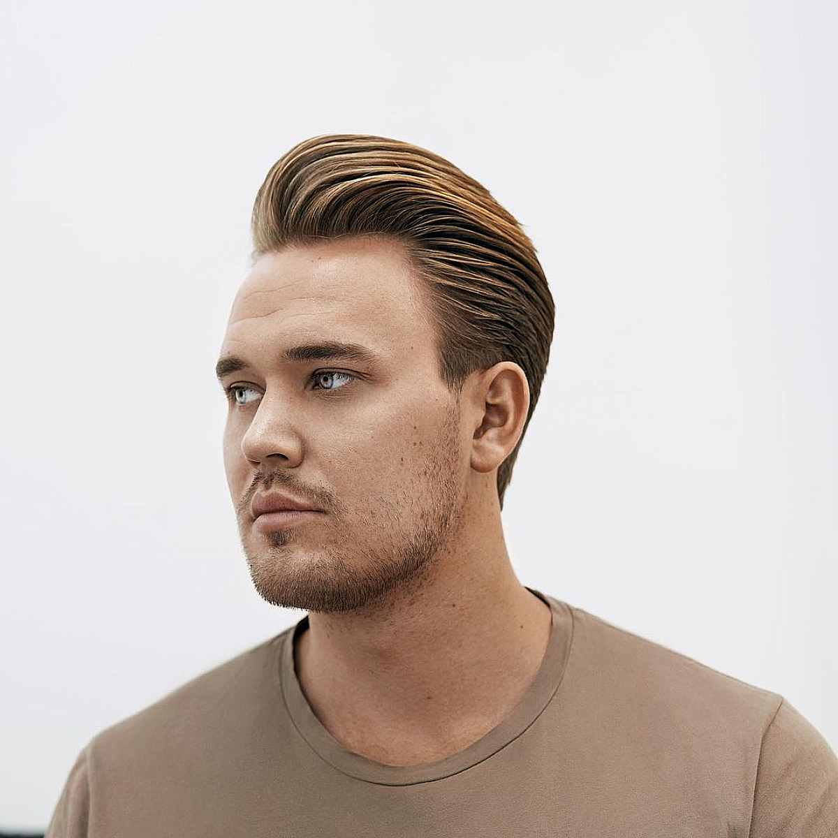 High Pompadour Men’s Hairstyle for Thick Hair