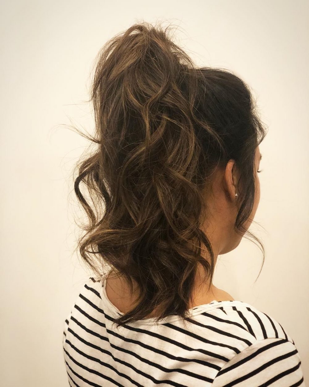 Messy High Ponytail with Curls