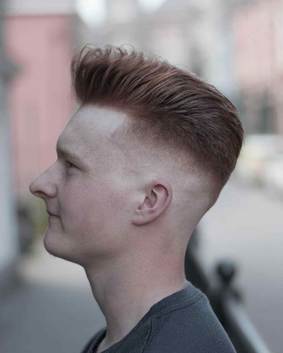 High Skin Fade with Brushed Up Top for Men
