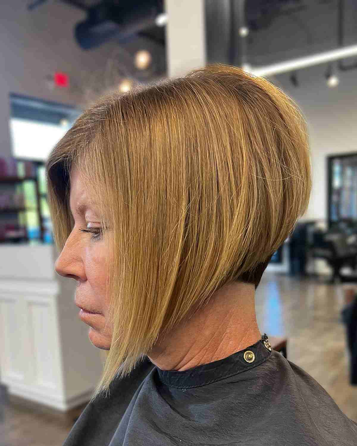 High Stacked Cut with a Warm Blonde Shade for Old Women