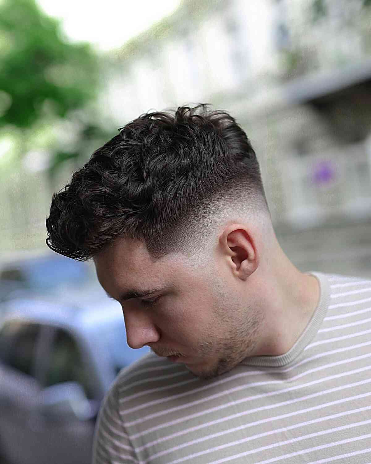 High Taper Fade for Men with Thick Wavy Hair