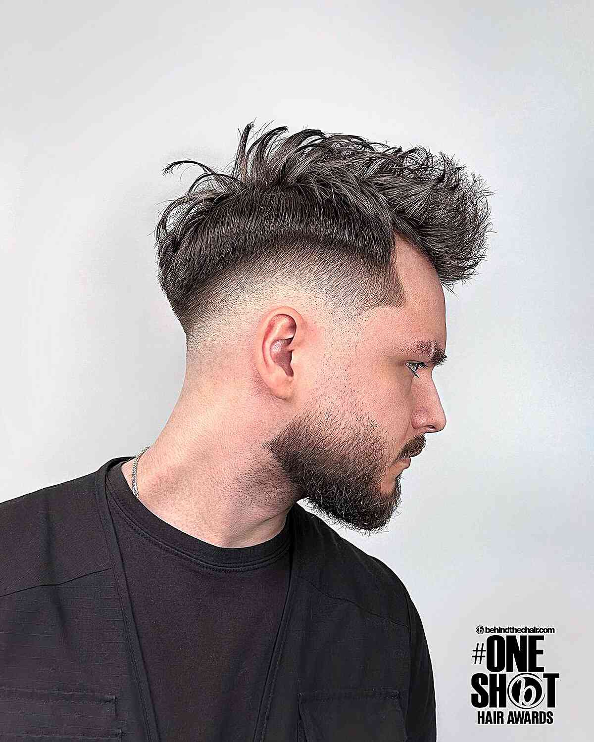 High Taper Fade with a Spiky Top for Men