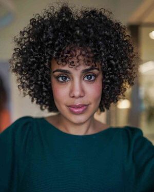 47 Best Short Curly Hair with Bangs to Try This Year