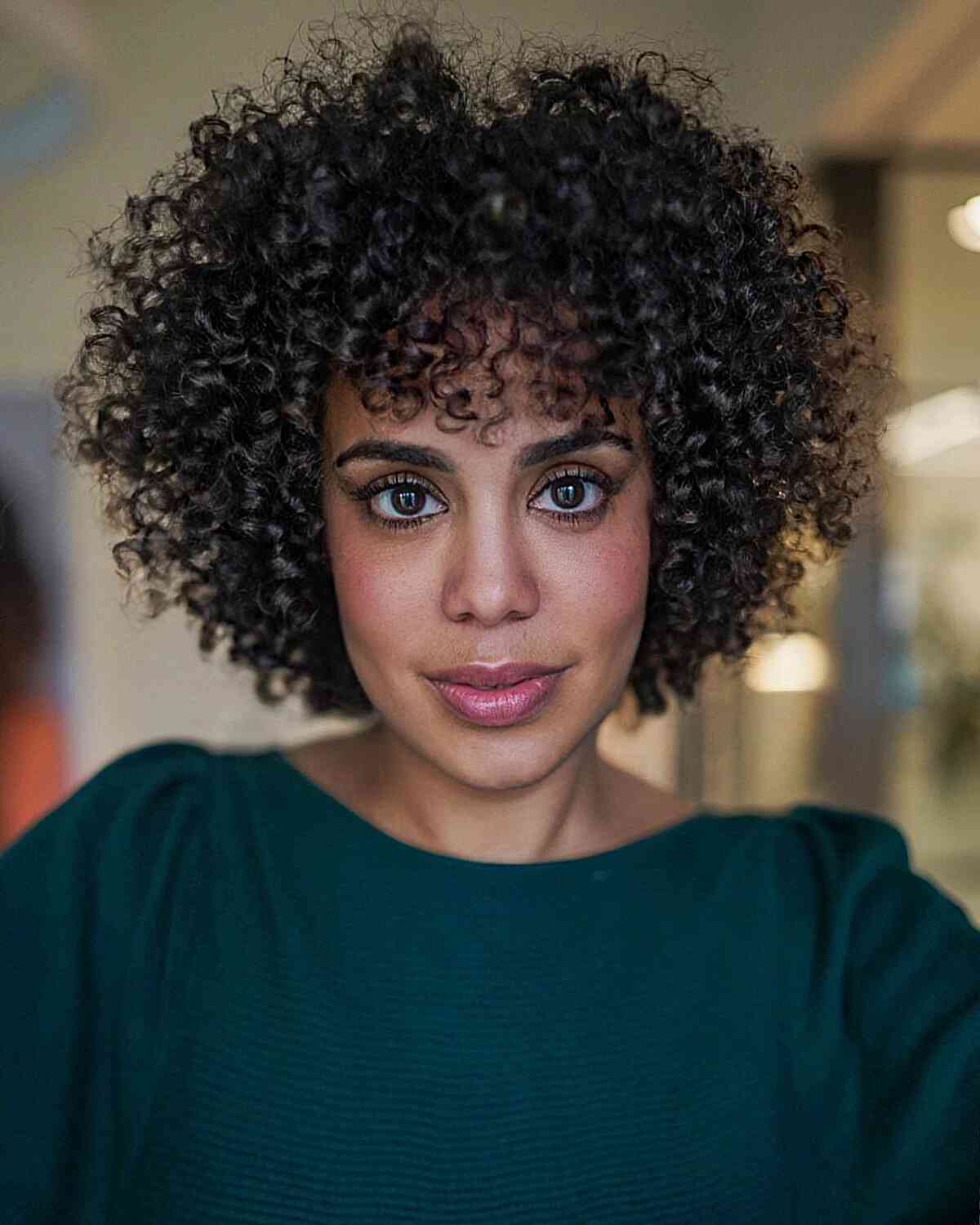 High Volume-Shaped Curls with Fringe for black ladies with tight coils