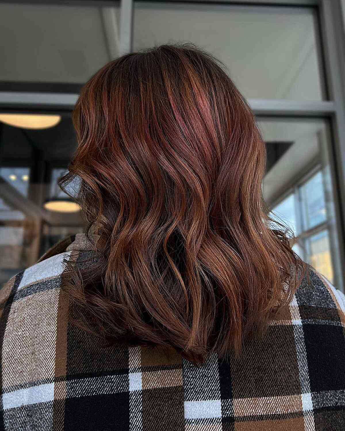 Hints of Brown Red Balayage Hues for Mid-Length Layered Cut