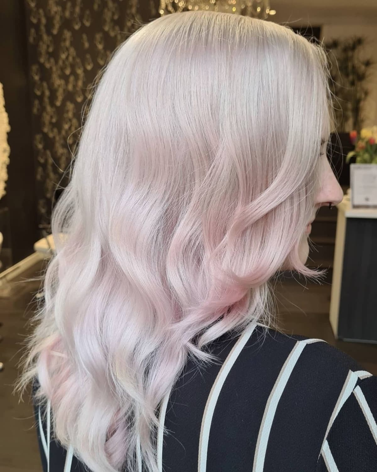 Hints of pink on white blonde hair