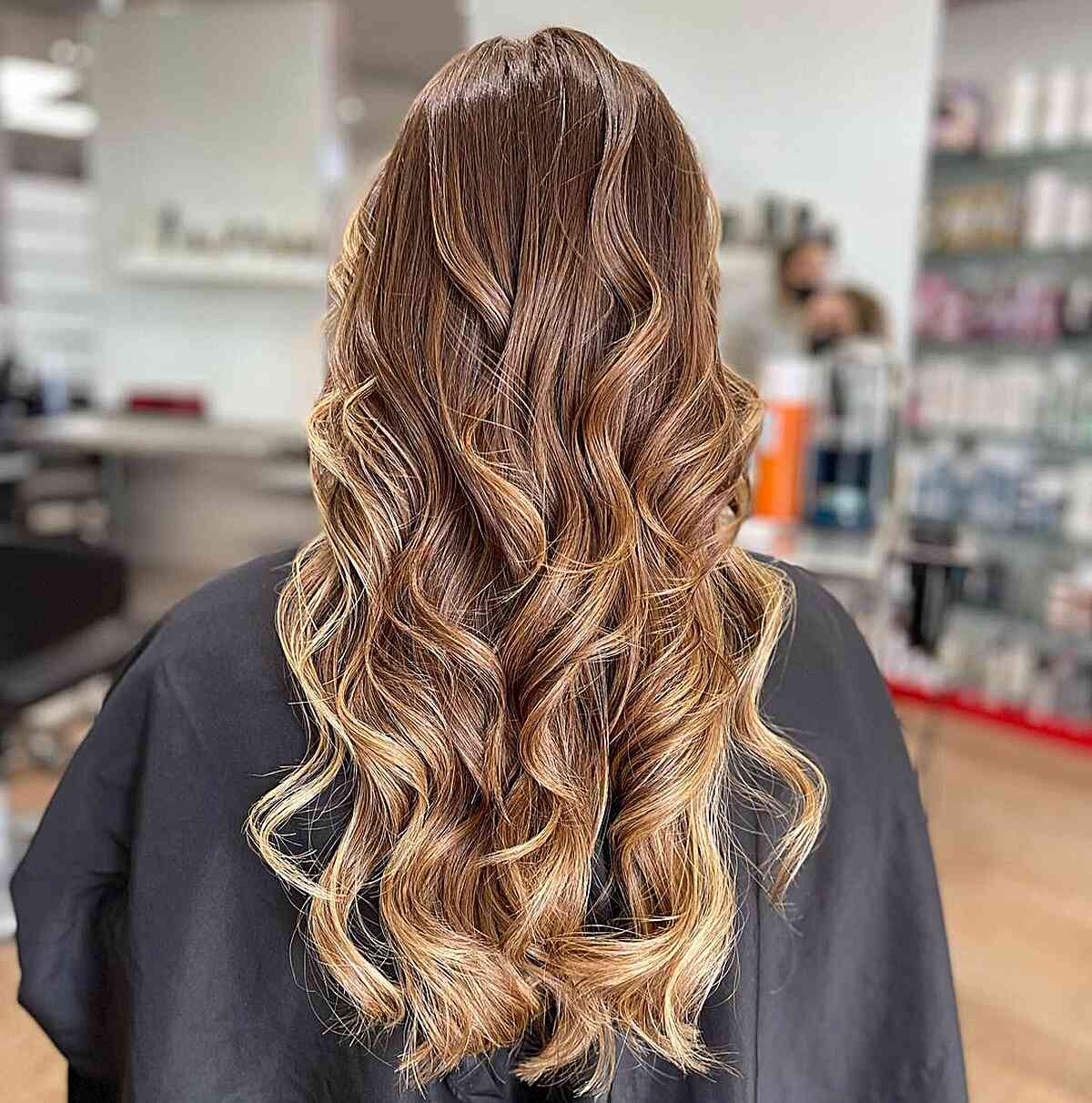 Hot Chocolate Balayage with Milky Accent on Long Blonde Hair with Curls