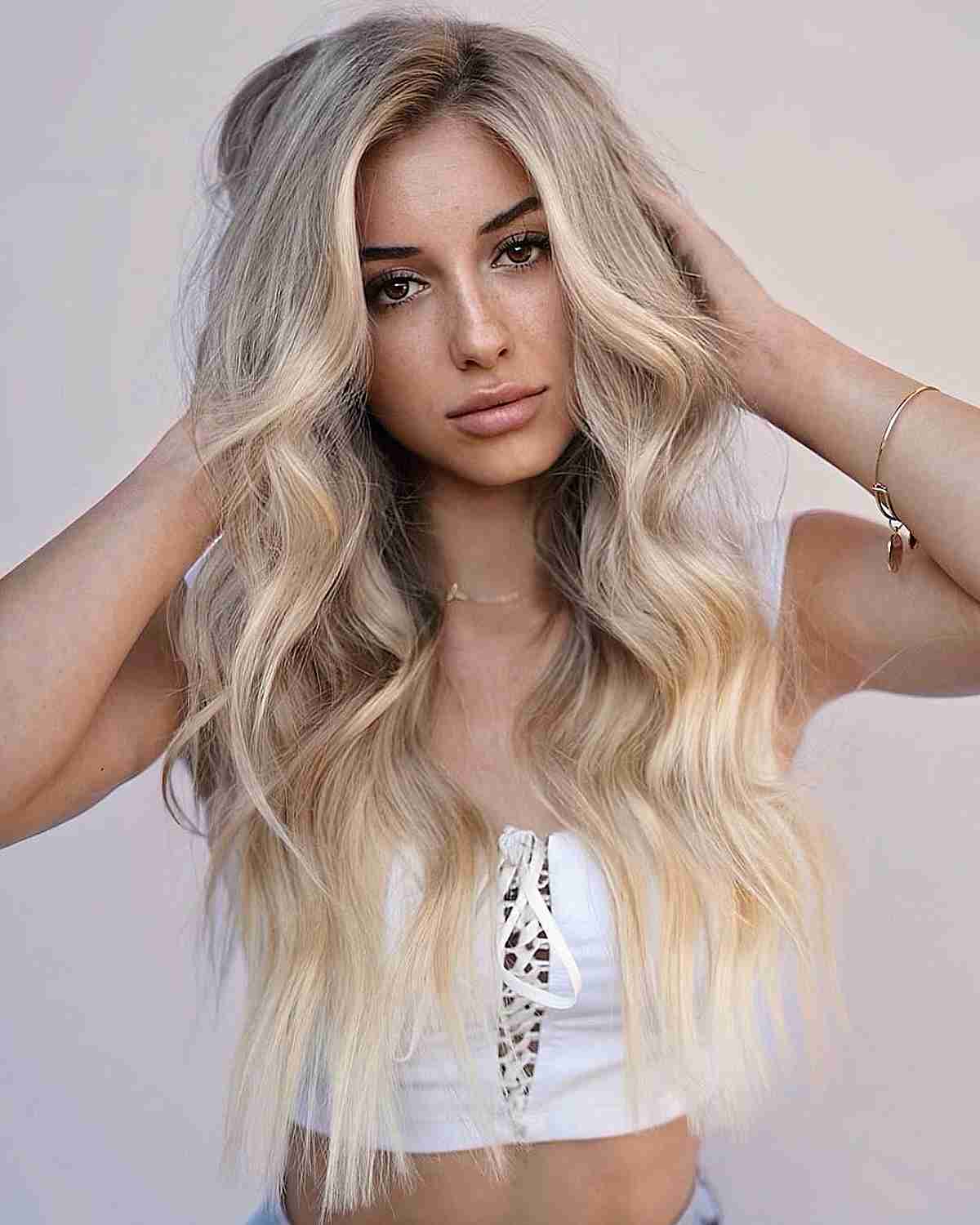 Iconic Blonde Long Subtle Waves with Blunt Tips
