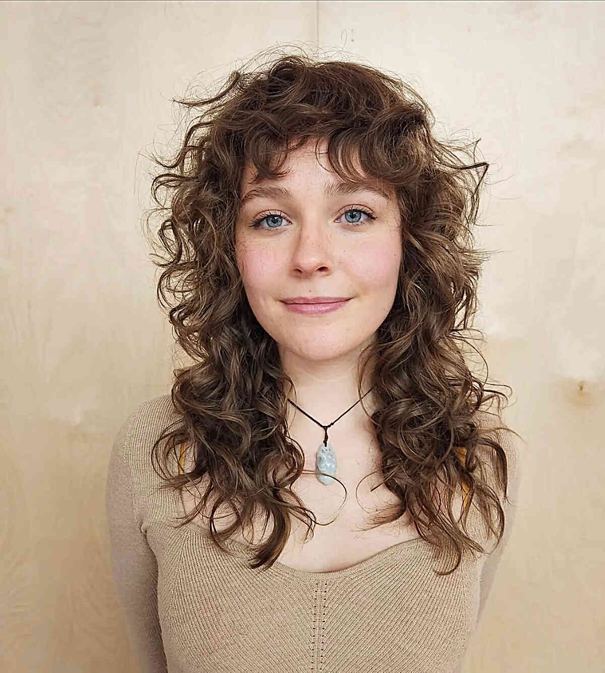 Iconic Shag with Messy Curls for ladies with medium-length hair