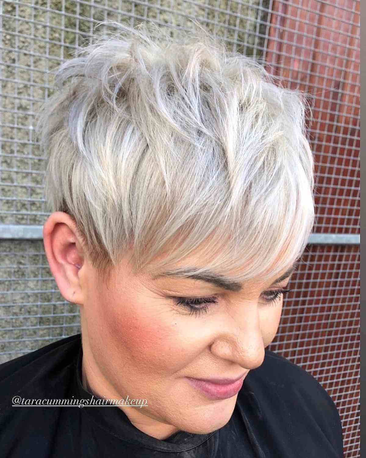 Icy Blonde Long Pixie Cut with Sweeping Bangs