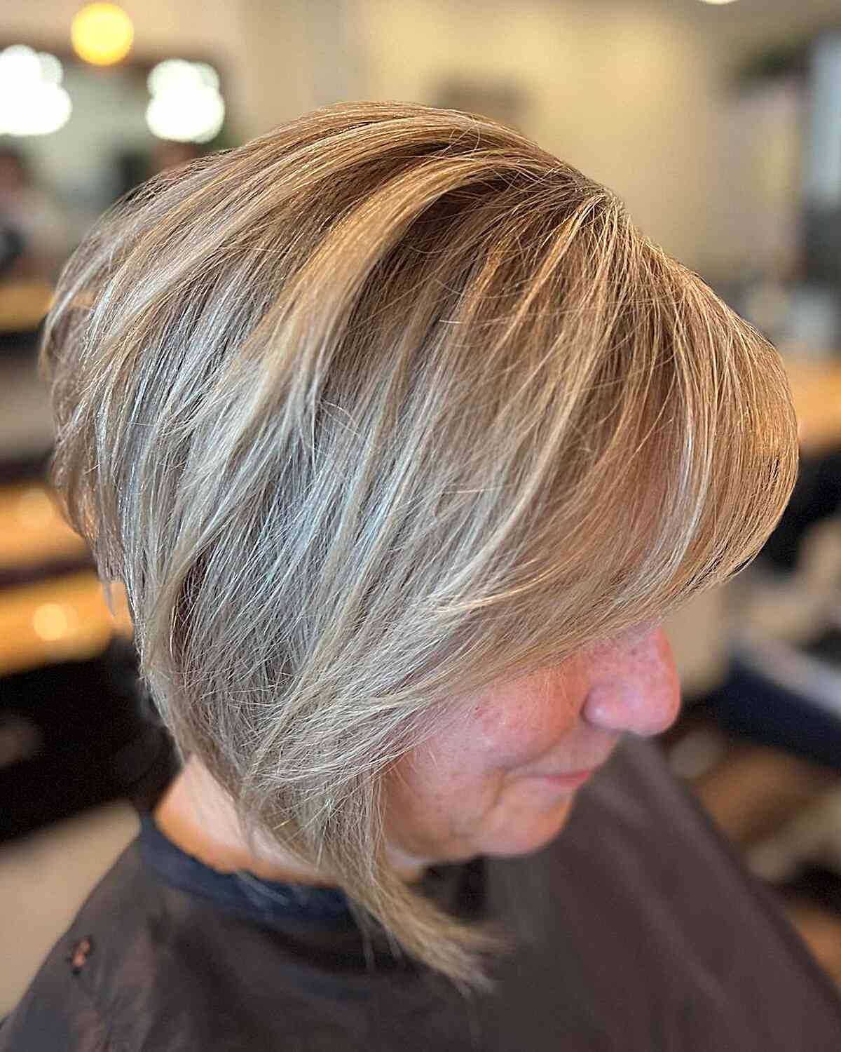 Icy Blonde Stacked Graduated Bob with Long Bangs on Fine Hair