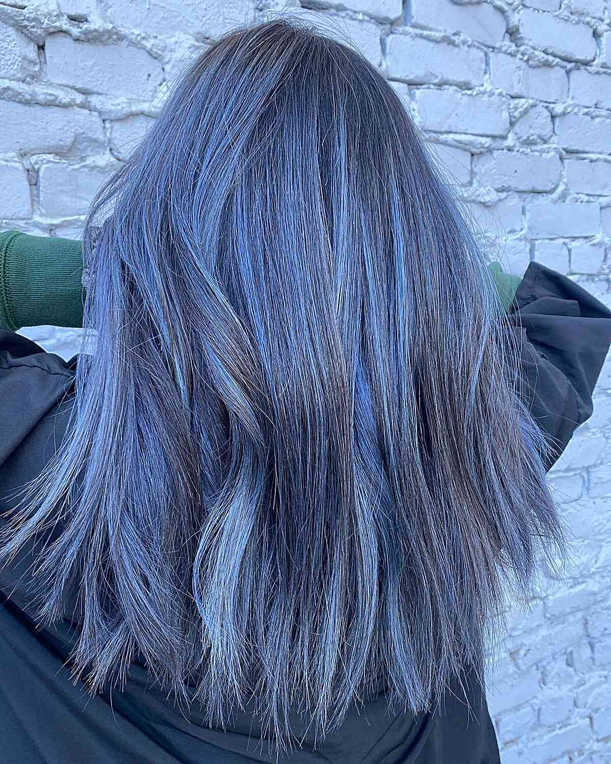Icy Blue Hair Balayage Highlights on Mid-Length Choppy Haircut
