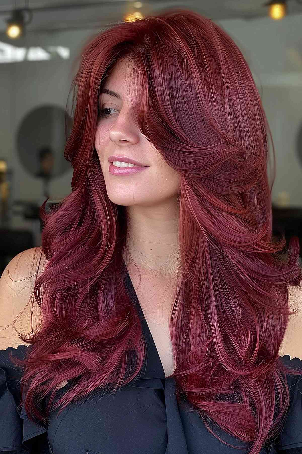 Mid-length cherry red hair with subtle gradient, perfect for dense, wavy textures.