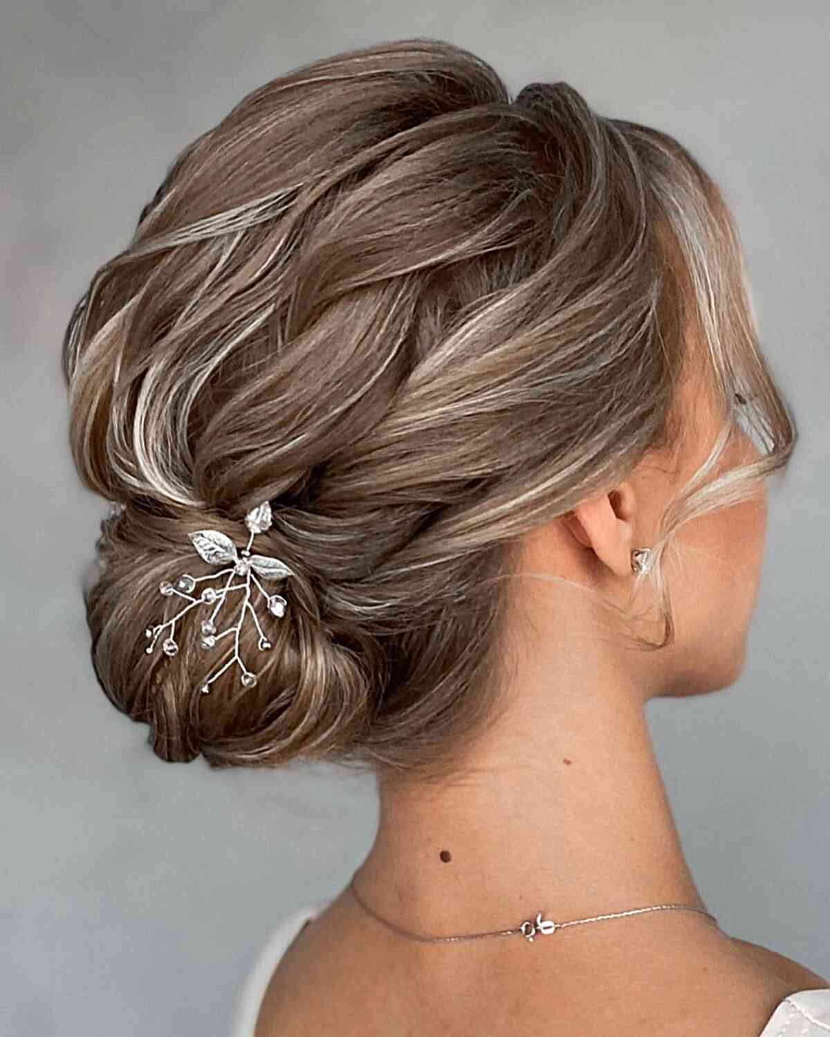 Intricate Bun Updo Hairstyle for girls with balayage hair
