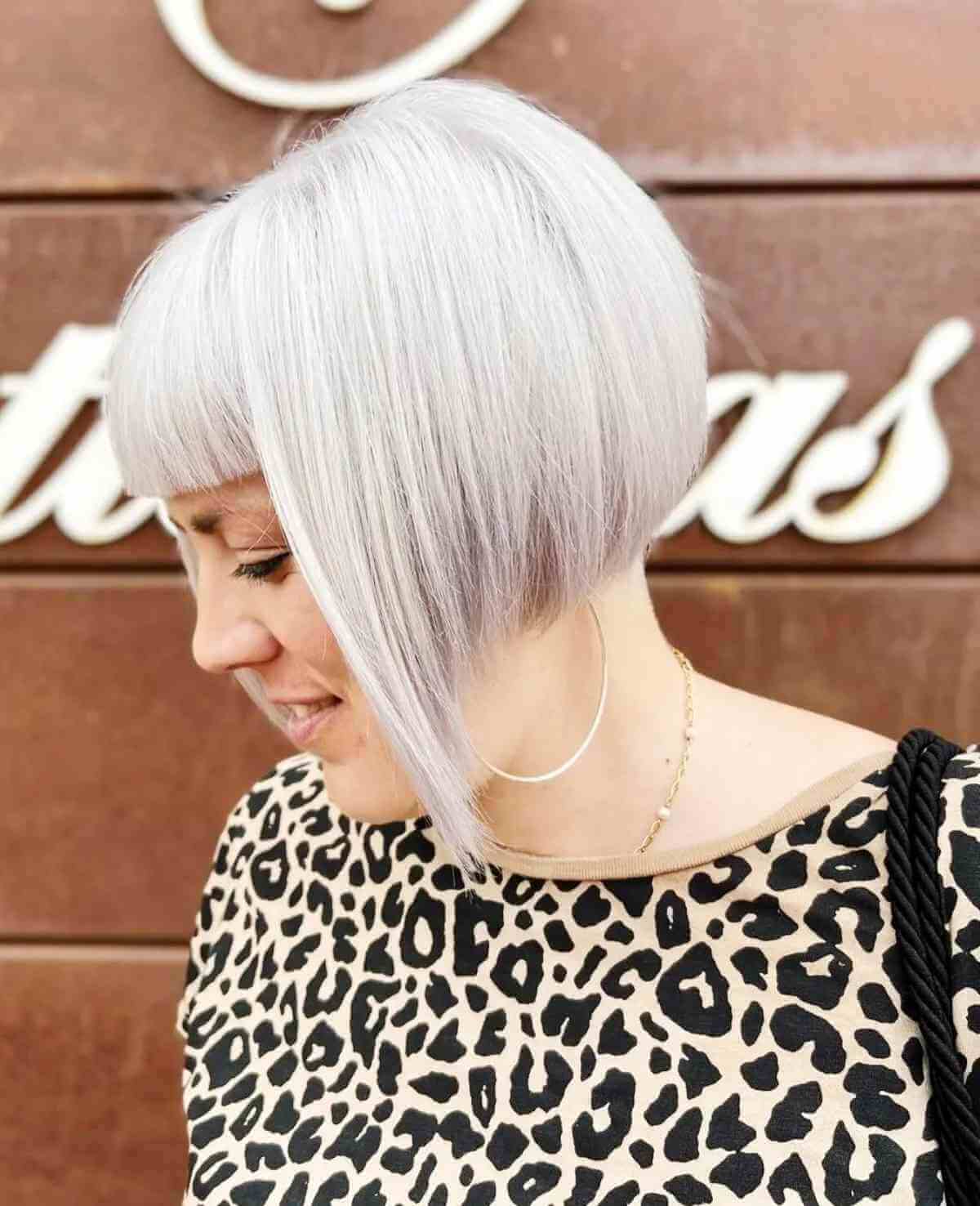 White blonde Inverted bob with bangs for thicker hair