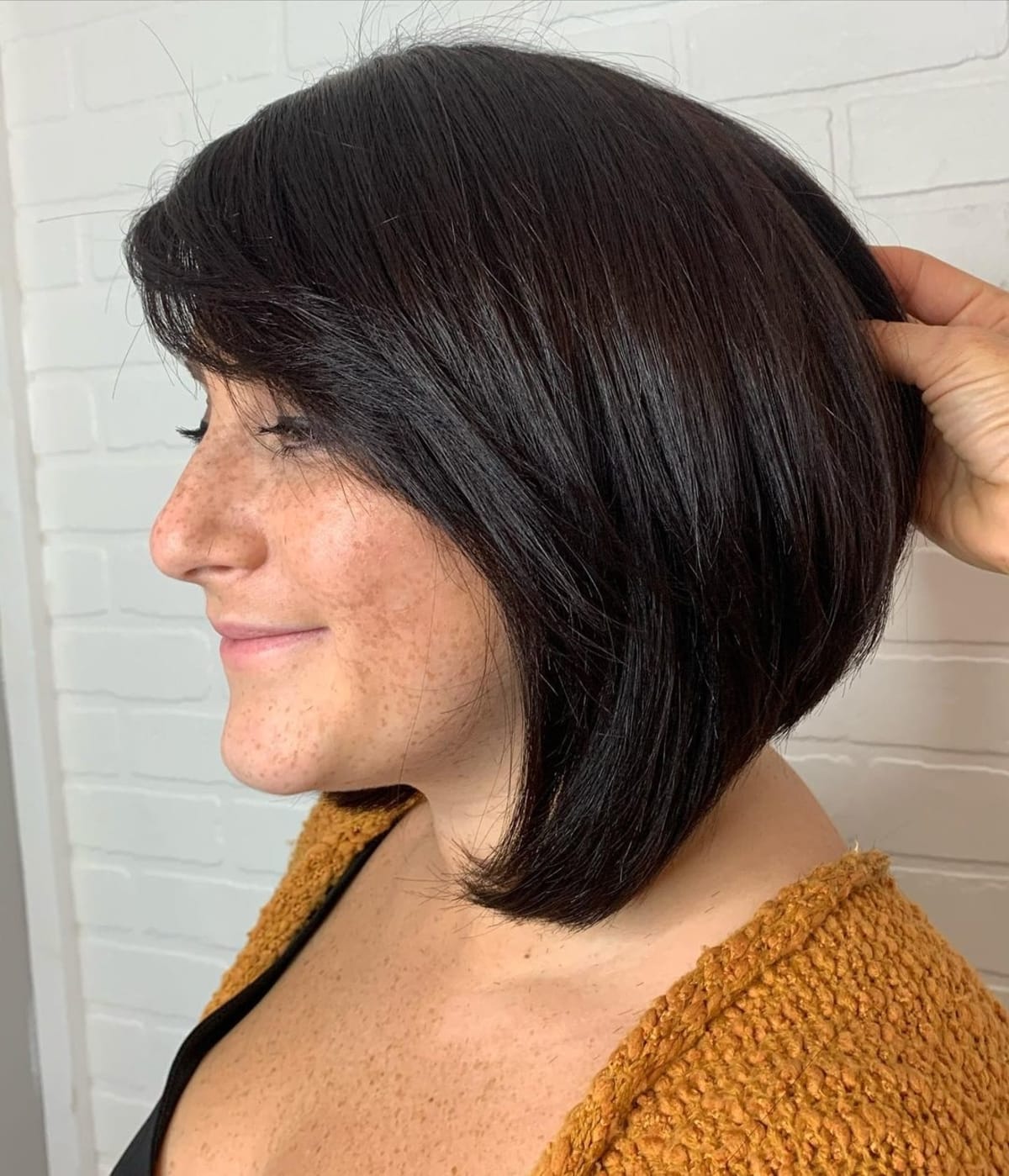 Sweet inverted bob with side swept bangs