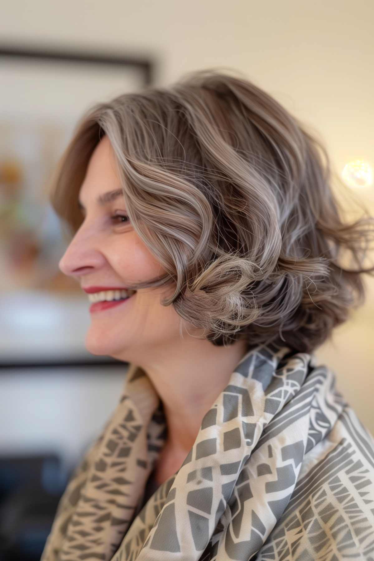 A woman with a wavy, inverted teacup bob.