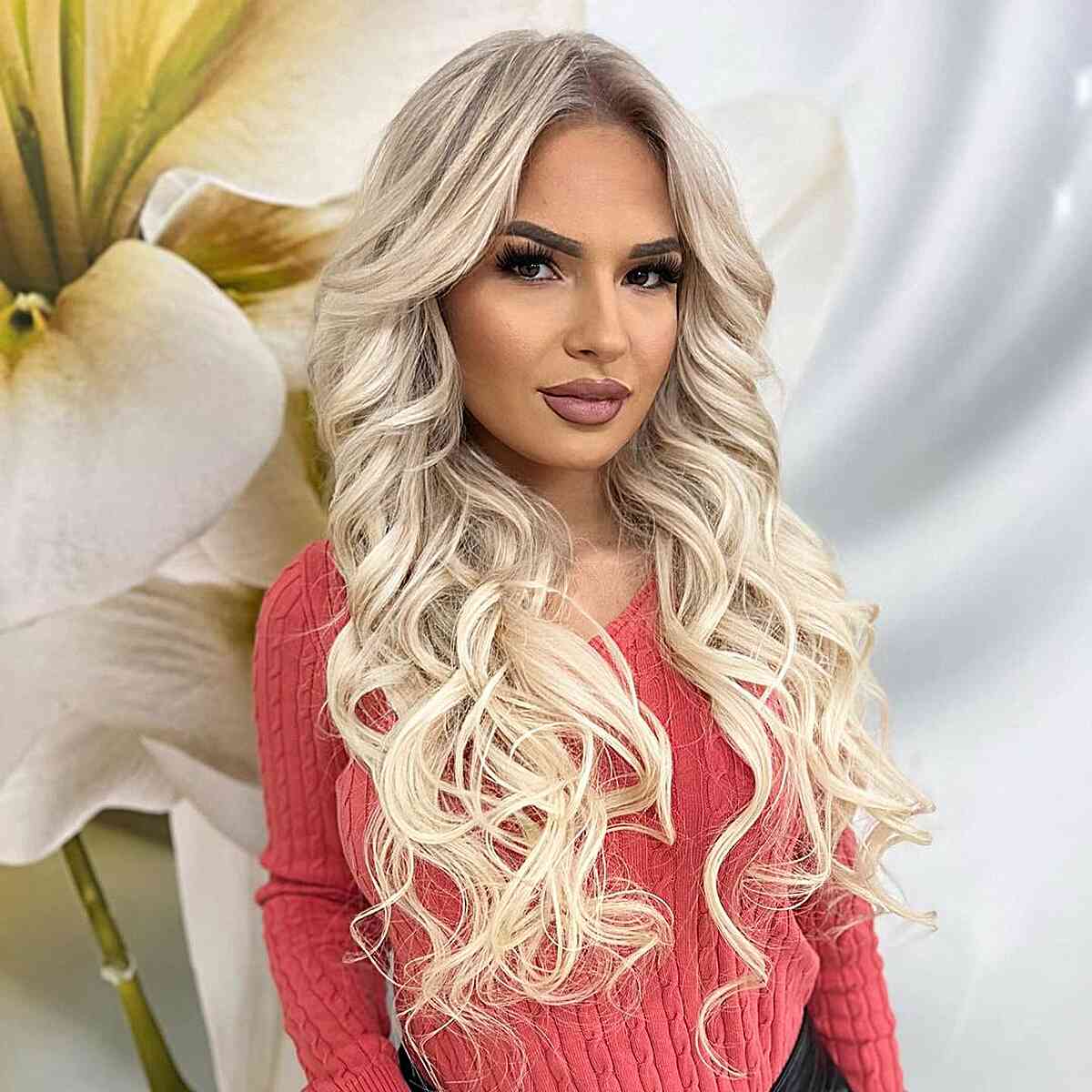 Jaw-Dropping White Blonde Long Hair with curled ends and a center part