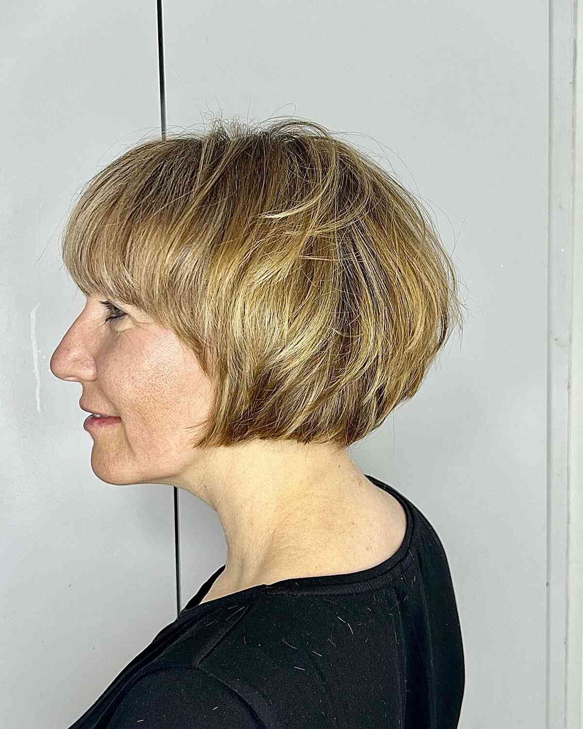 Jaw-Grazing Soft Messy Blonde French Bob for 60-Year-Old Ladies