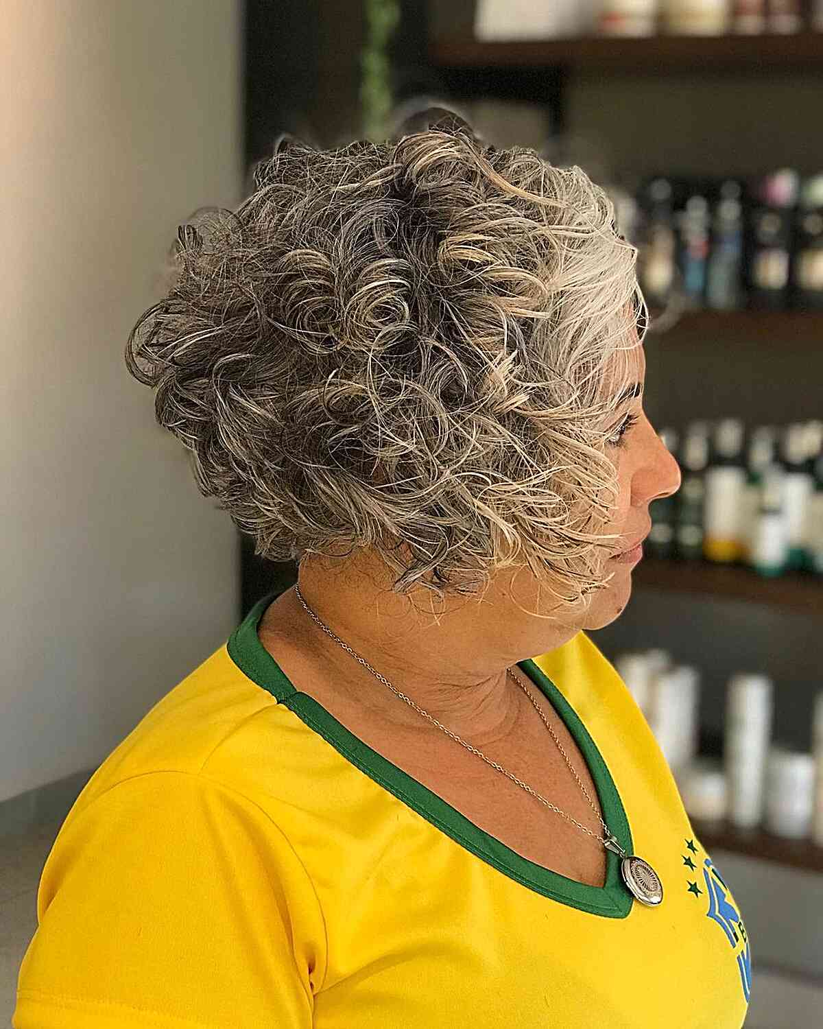 Jaw-Length Curly Wedge Cut for 60-year-olds
