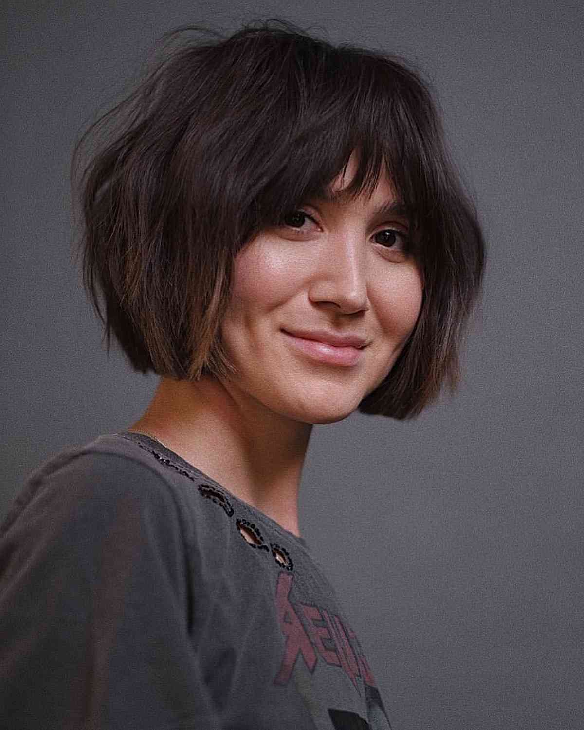 Jaw-Length Cut with Wispy Layers and Bangs