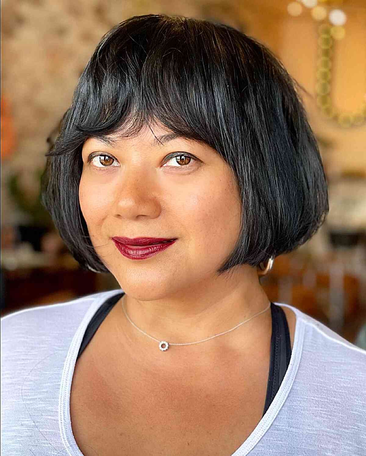 Jaw-Length French-Inspired Bob Cut with fringe