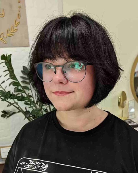 A Jaw-Length Graduated French Bob with Thick Bangs for Women's Round Face and Dense Hair