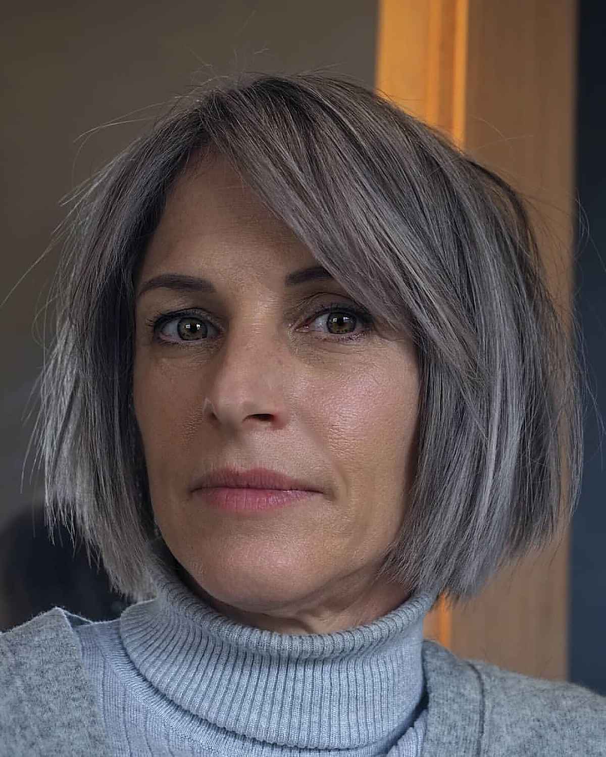 Jaw-Length Gray Bob with Side Bangs for Older Ladies