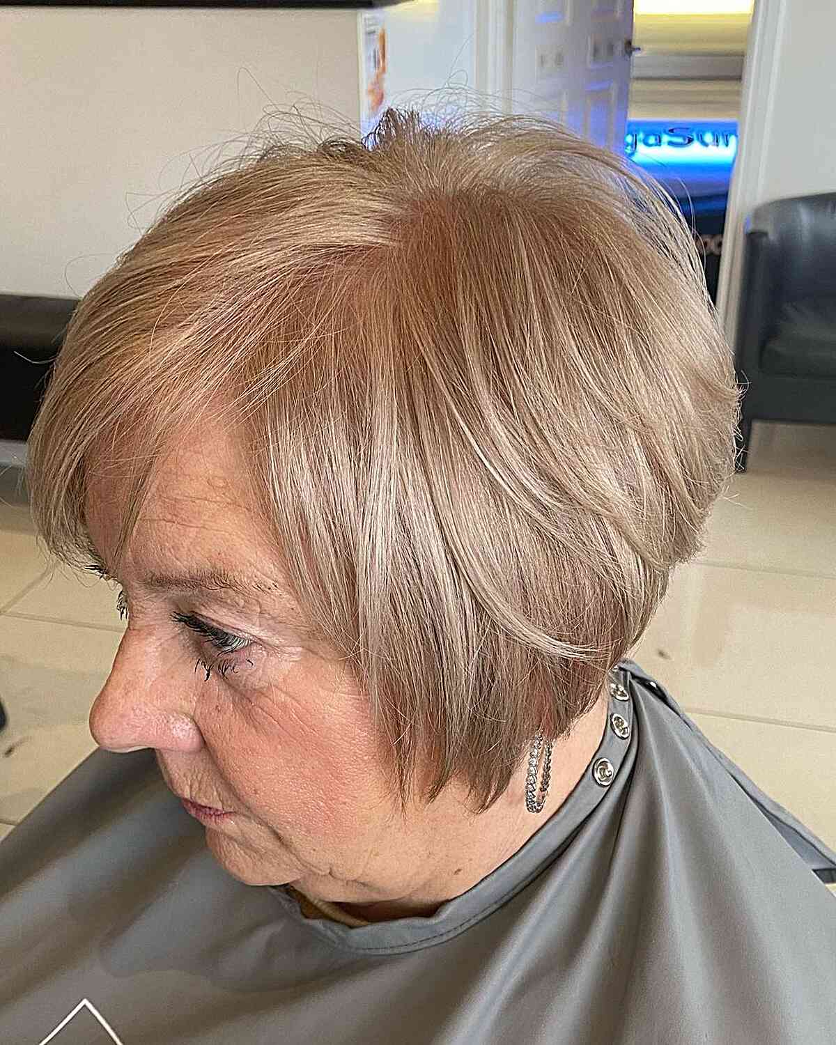 Jaw-Length Mini Layered Bob with Beige Blonde Color for 60-Year-Olds